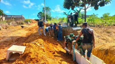Jelang Semenisasi, Satgas TMMD dan Warga Pasang U 40 di Kampung Seraya Batam